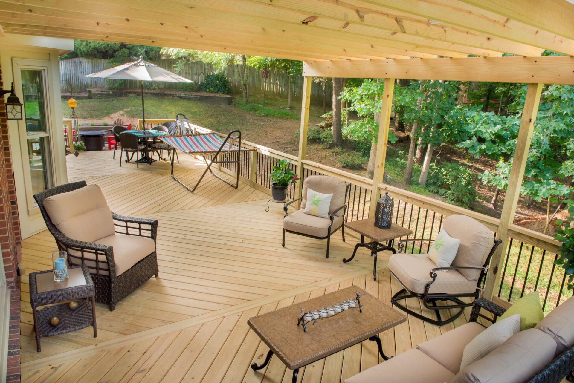 Custom wood deck with diagonal board pattern and attached pergola in Sardis Forest, South Charlotte.